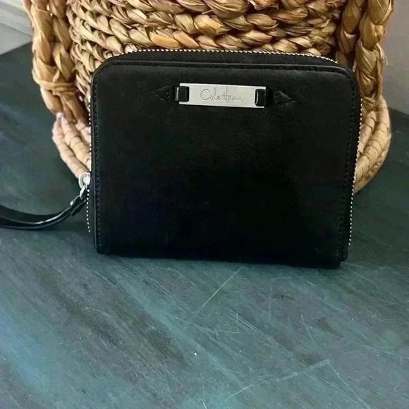 Cole Haan Black Leather Wristlet
Clutch Leather - Picture 1 of 4